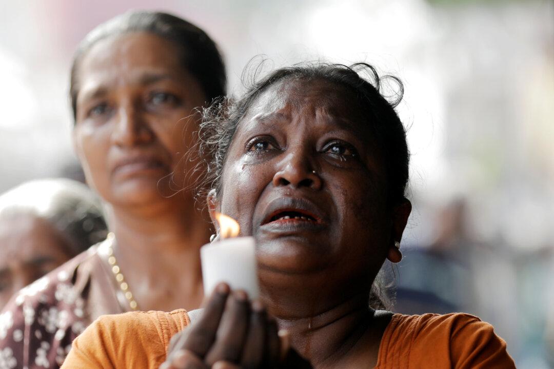 Sri Lanka Detains Syrian in Investigation of Blasts, Toll Rises to 321