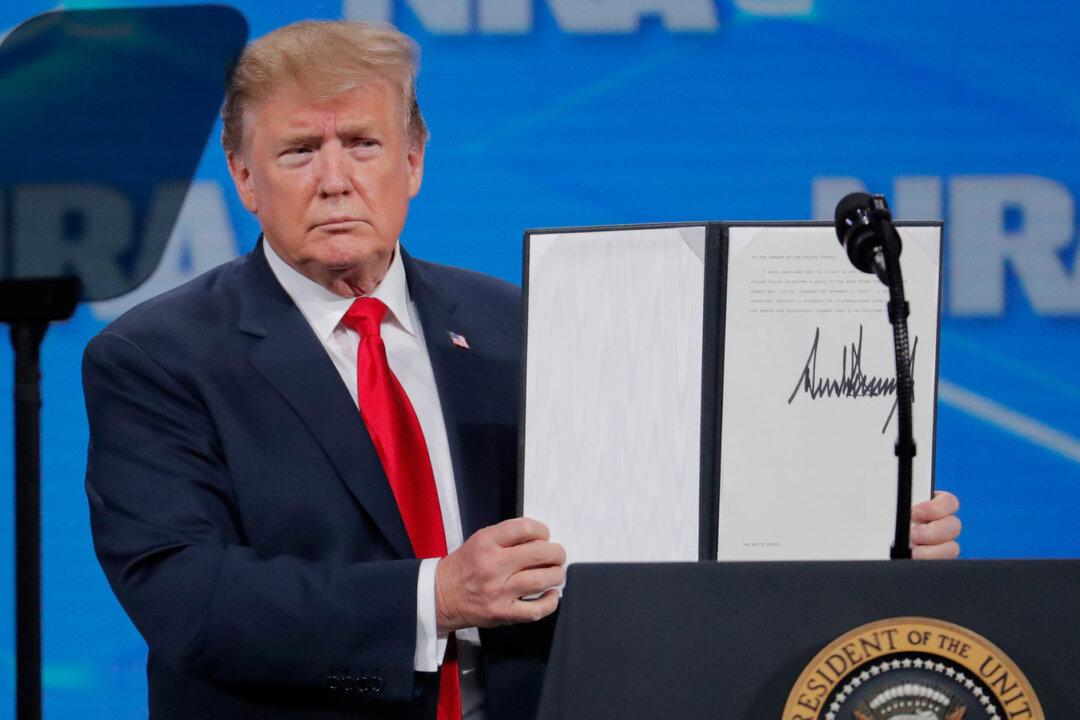 Man Charged After Cell Phone Was Thrown on Stage During Trump’s Speech at NRA Convention