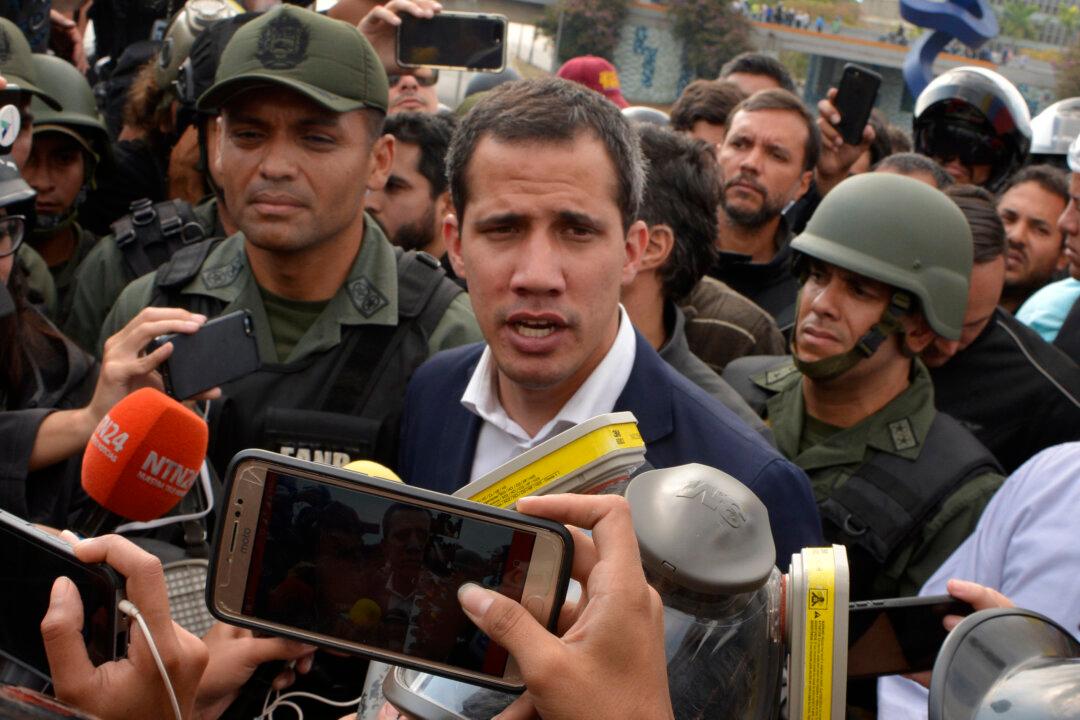 Armored Vehicle Runs Down Protesters as Clashes Intensify in Venezuela