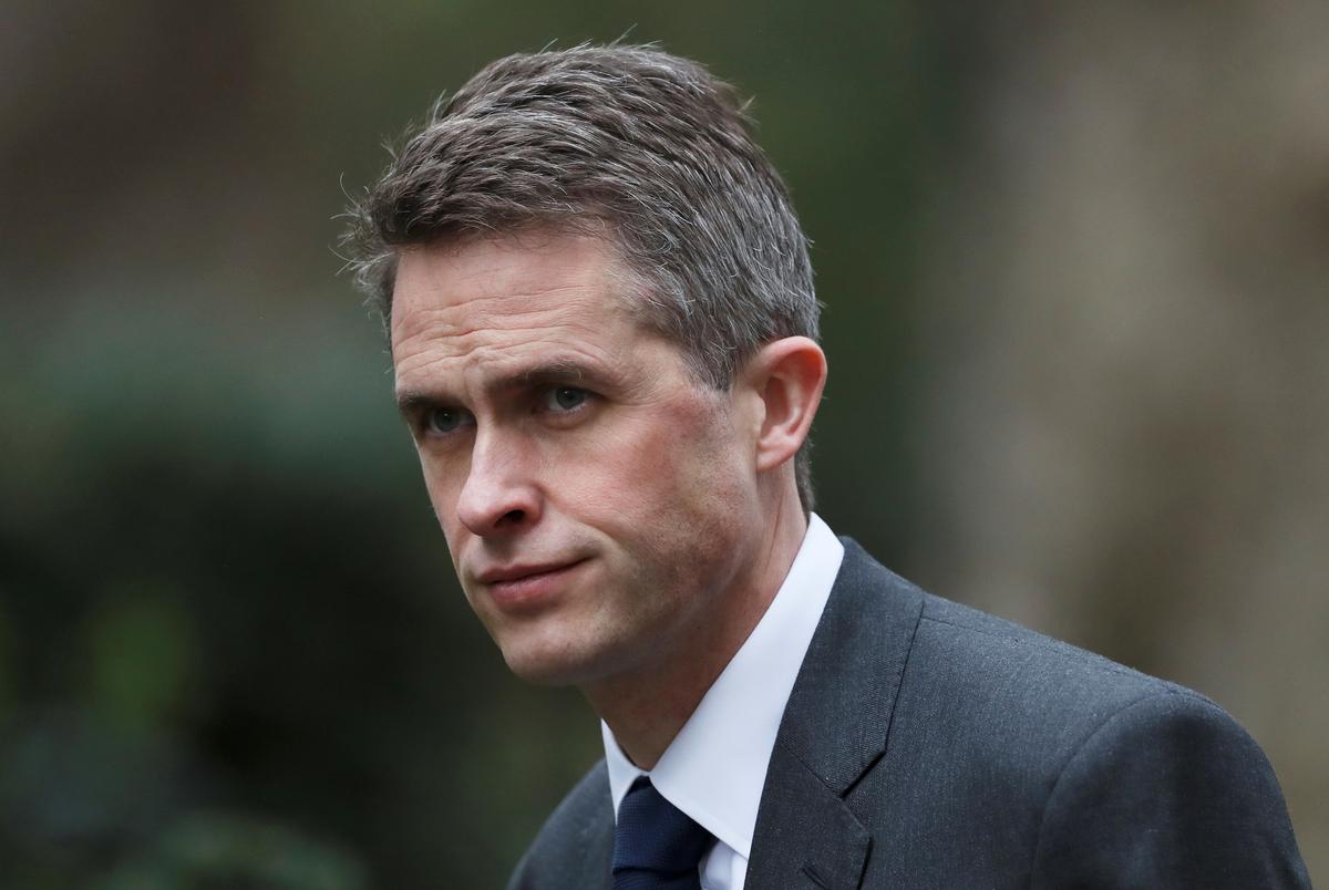 UK’s May Fires Defense Secretary Over Huawei Leak
