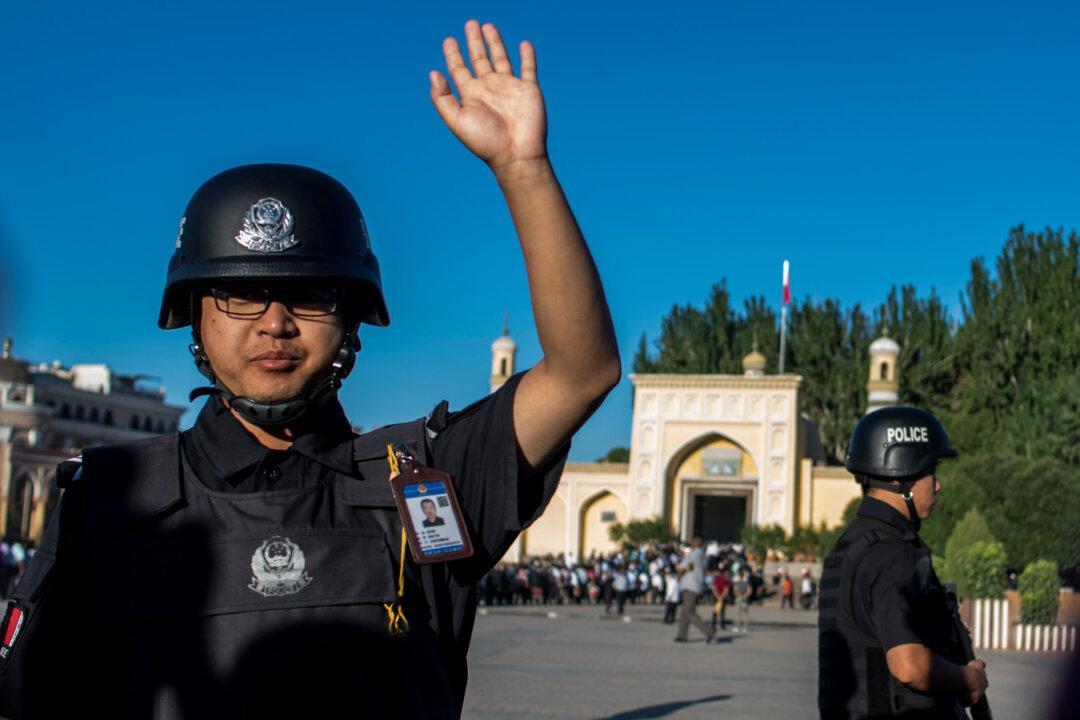 Police Surveillance App in Xinjiang Targets 36 Types of ‘Problematic’ People, Report Says
