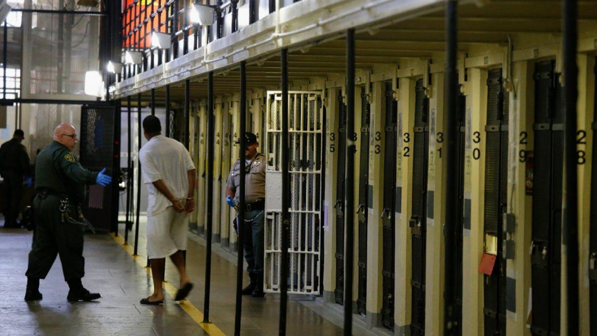 Stock photo of a condemned inmate led out of his east block cell at San Quentin State Prison, in San Quentin, Calif. on March 13, 2019. (Eric Risberg/AP)