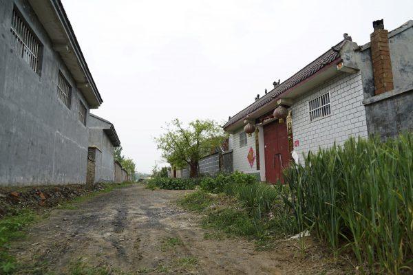 Lanterns hang over the front door of the former home of Li Tao and Mahek Liaqat in Li's hometown of Chenlou, Pei County in eastern China's Jiangsu Province, April 29, 2019. Li went to Pakistan to construct roads several years ago as part of China's Belt and Road initiative. He married Liaqat through an agent there and returned to China with her last winter, but the marriage broke down quickly and Liaqat returned to Pakistan several months later. (Dake Kang/AP Photo)