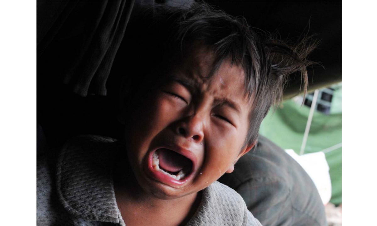 Woman Caught on Camera Beating Bound Naked Boy Outside