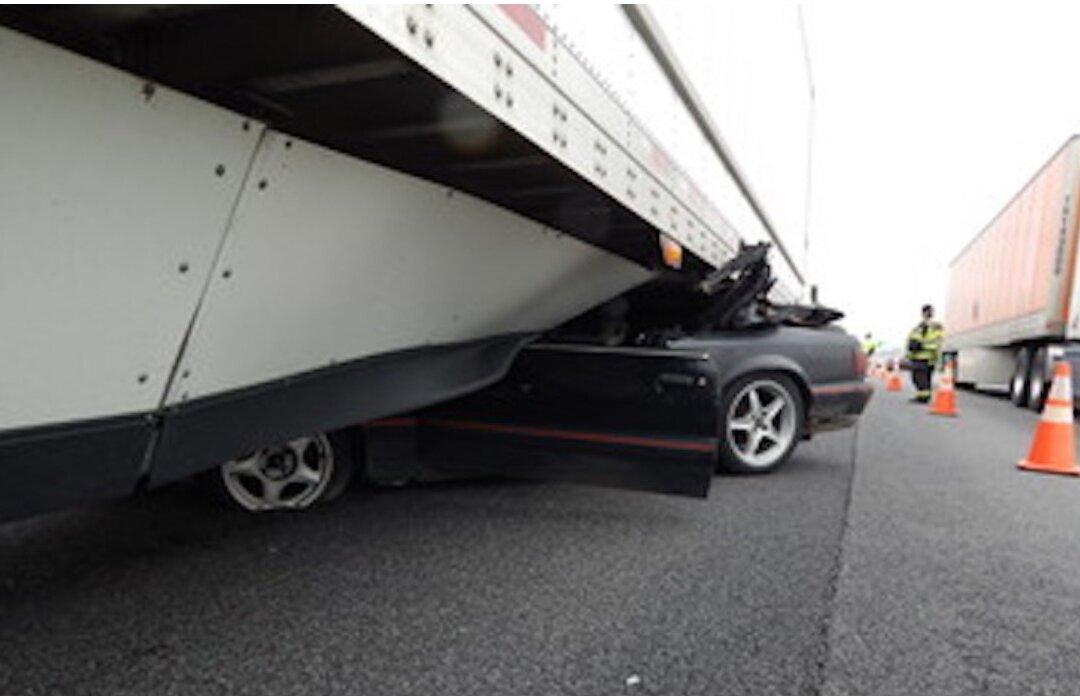 Driver Unscathed After Mustang Dragged Under Semi-Trailer for Half a Mile
