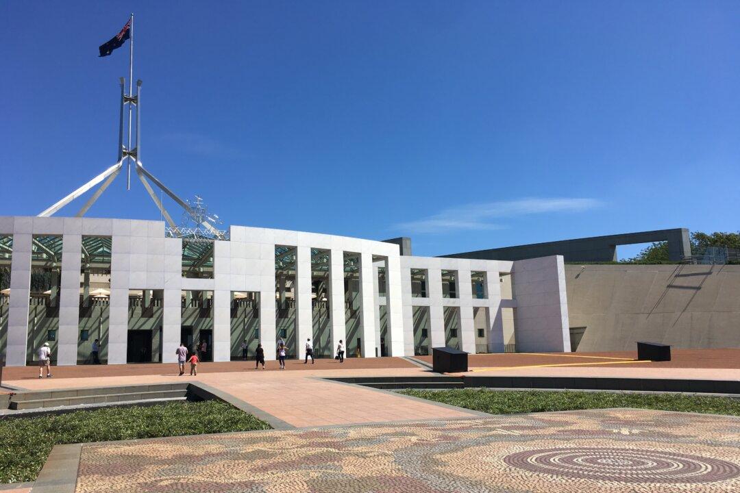 China State-Media Reporter Tries to Stop Cameraperson Filming Her During Aussie PM Press Conference