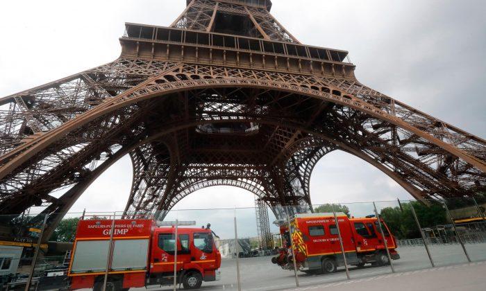 Eiffel Tower Evacuated as Man Seen Climbing the Landmark