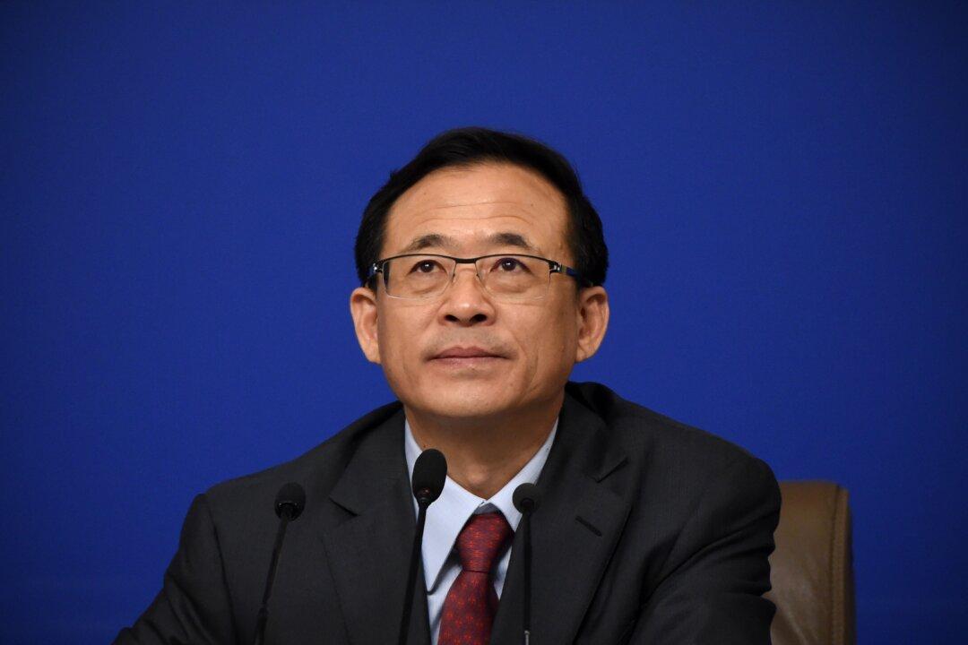 Former Chairman of China Securities Regulator Surrenders to Anti-Corruption Investigators