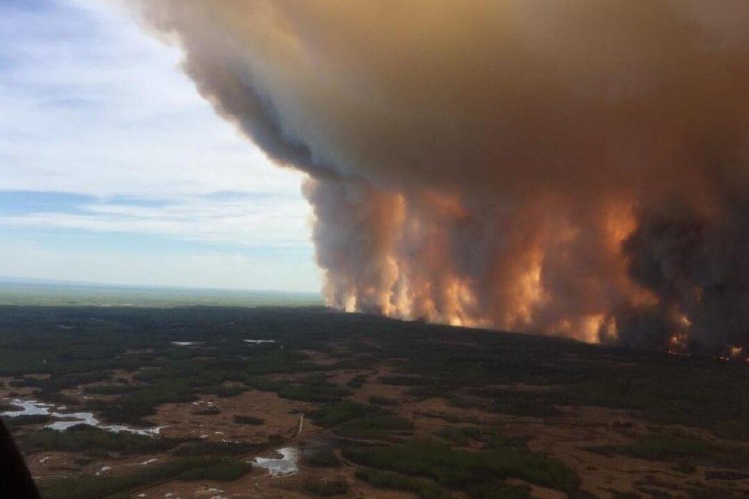 Thunderstorms Bring Hope of Rain, but Also Lightning, for Alberta’s Wildfires