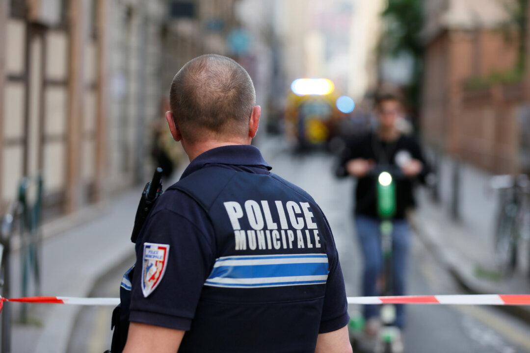 French Police Hunt Suitcase Bomber After Blast in Lyon