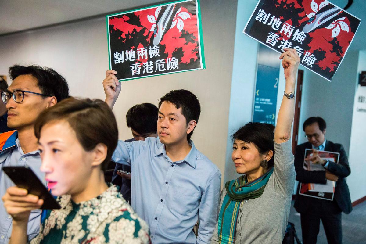 Former Hong Kong Lawmaker Ted Hui Goes Into Exile