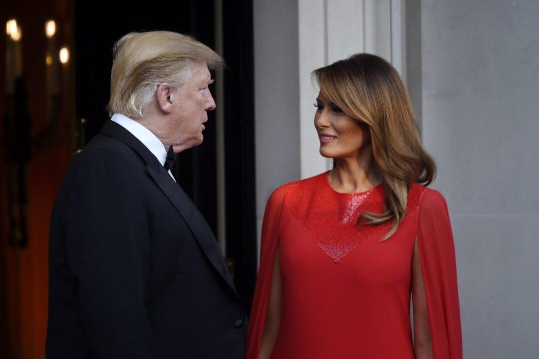 Melania Trump Stuns in Red Cape-Sleeve Gown at Dinner During UK State Visit
