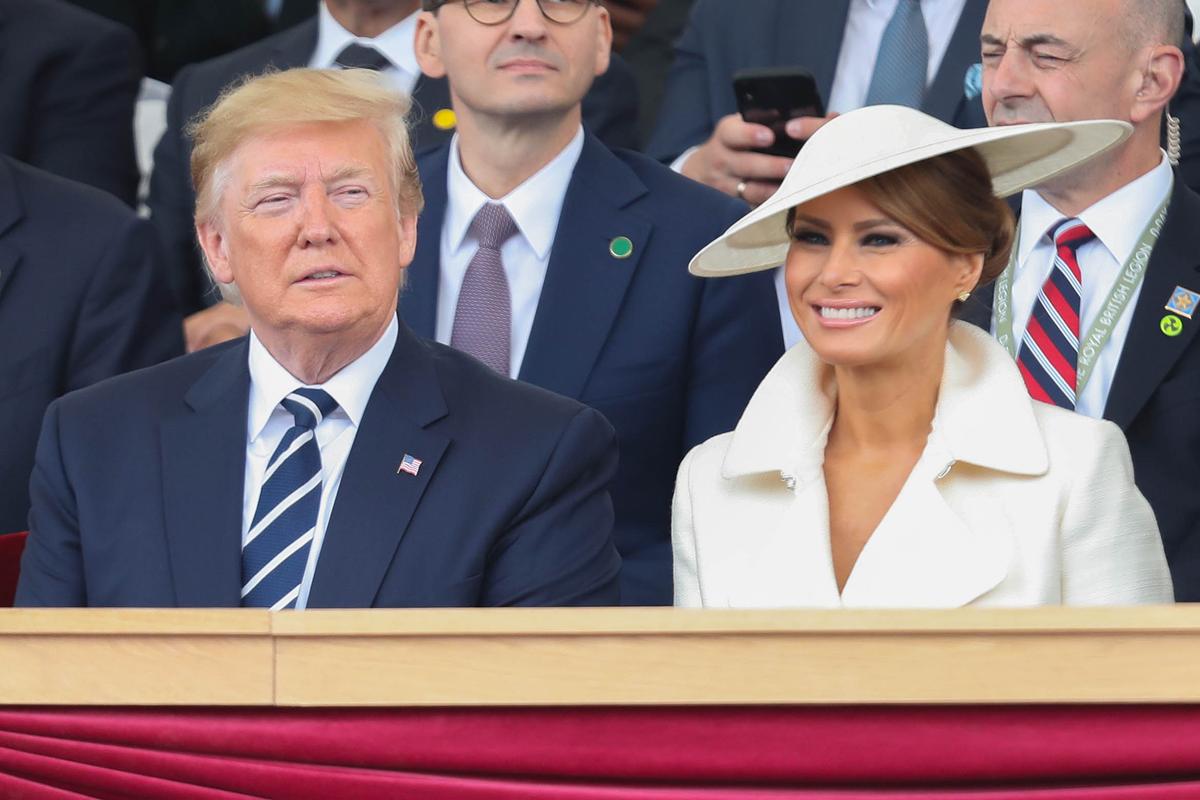Melania Trump’s Charming Ivory Coat-and-Hat Combo Turns Heads During D-Day Commemoration Events