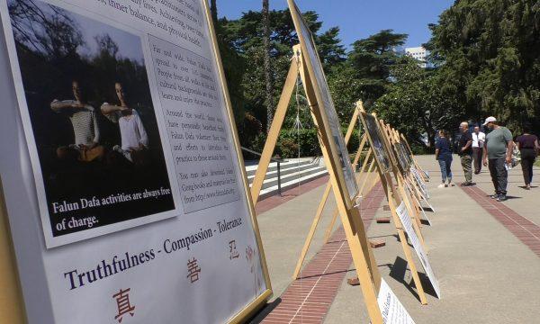 Signs in front of the capitol with information about the practice Falun Gong as well as the Chinese regime's persecution in Sacramento, California, on June 11, 2019. (Daniel Holl/The Epoch Times)
