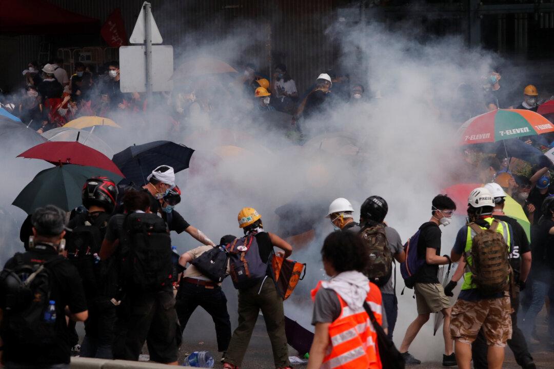 Uneasy Calm in Hong Kong After a Day of Protest Against Extradition Bill