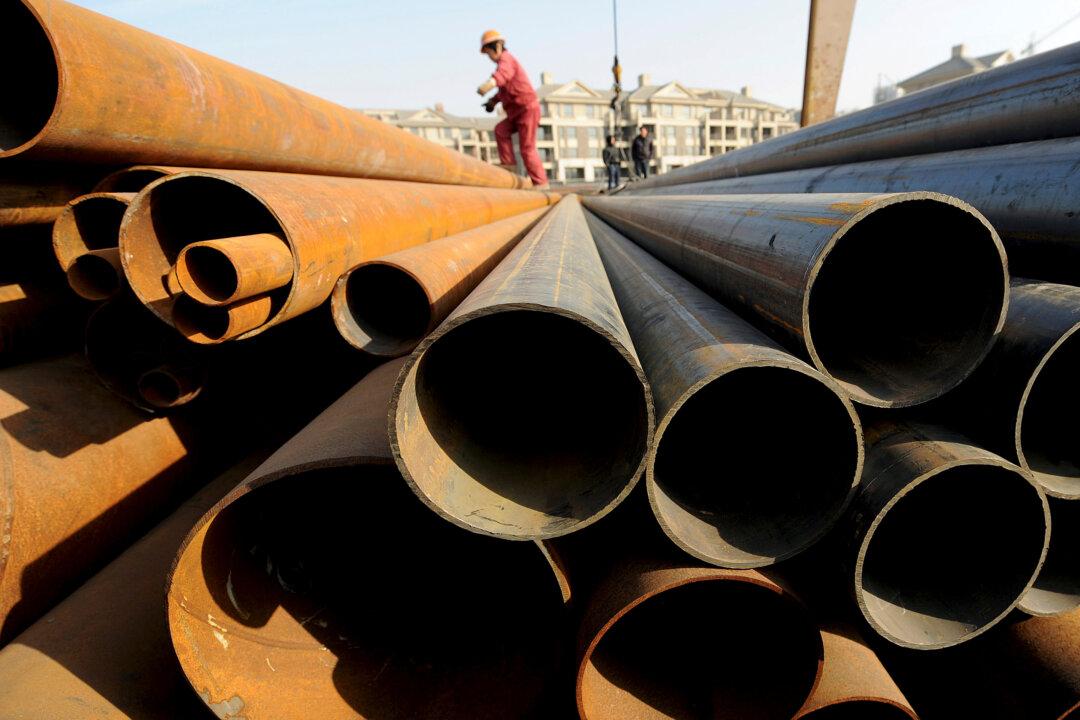 China Pulls WTO Suit Over Claim to be a Market Economy