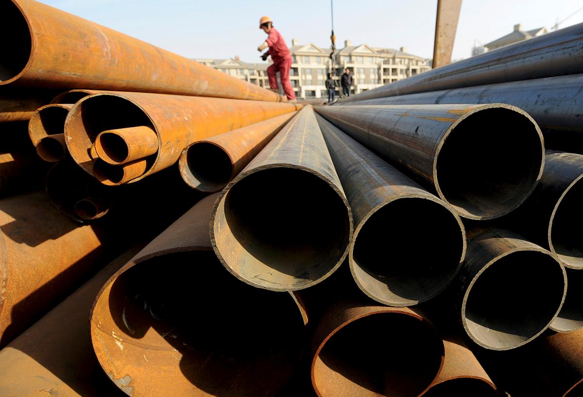 China Pulls WTO Suit Over Claim to be a Market Economy