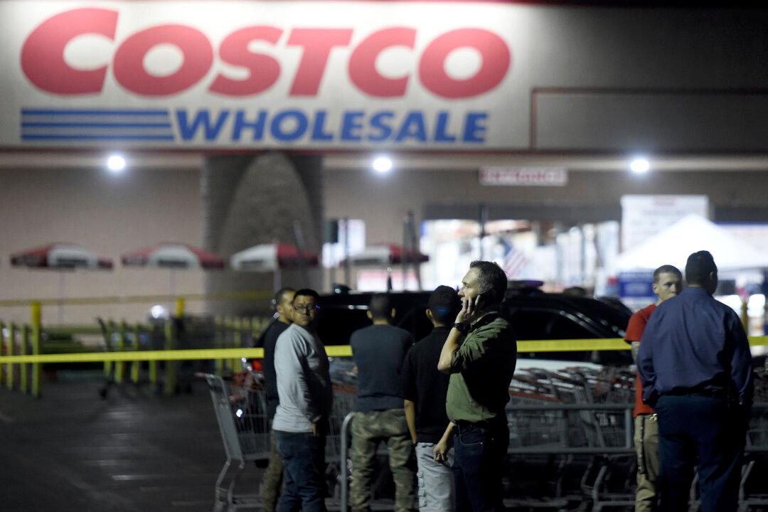 Off-Duty Officer Who Shot 3 at Costco Was First Knocked Unconscious While Holding Son, Says Attorney