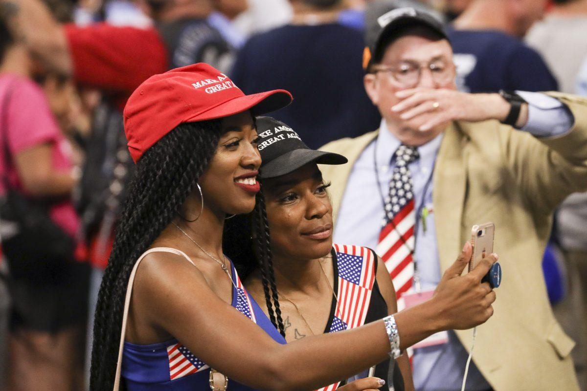 Audience members at President Donald Trump’s 2020 re-election event in Orlando, Fla., on June 18, 2019. (Charlotte Cuthbertson/The Epoch Times)