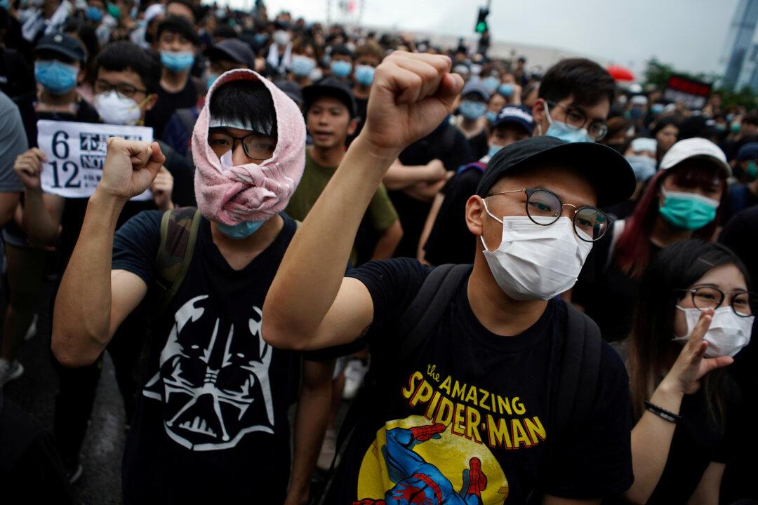 Activists in Hong Kong Make Pitch to Extradition Protesters: Register to Vote