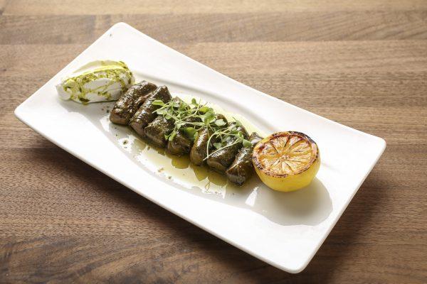 Dolmadakia, stuffed grape leaves. (Samira Bouaou/The Epoch Times)