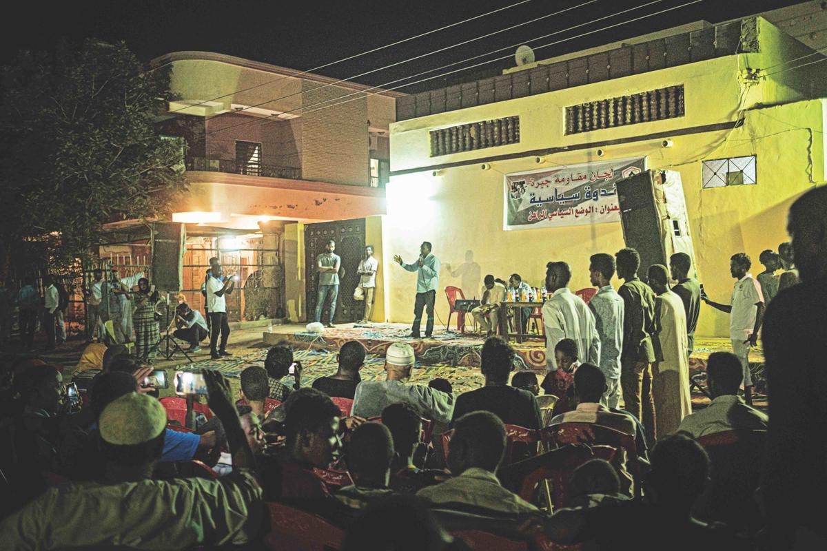 Sudanese people attend a direct dialog with the opposition in the capital Khartoum on June 19, 2019. YASUYOSHI CHIBA/AFP/Getty Images