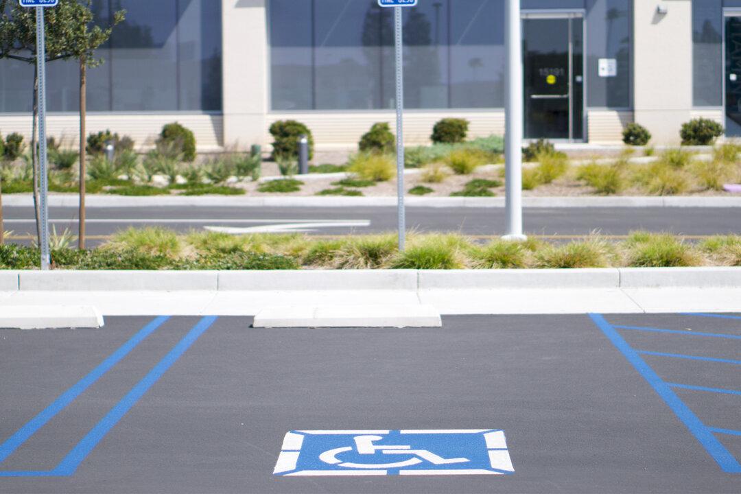 Woman Illegally Parks in Handicap Spot, Watch Disability Van Driver Teach Her a Lesson