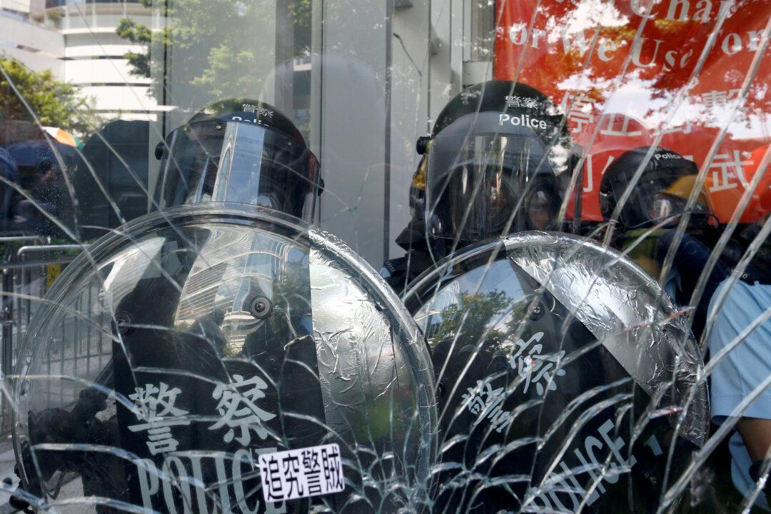 Hong Kong Police Tactics Baffle Security Experts as Legislature Building Is Trashed