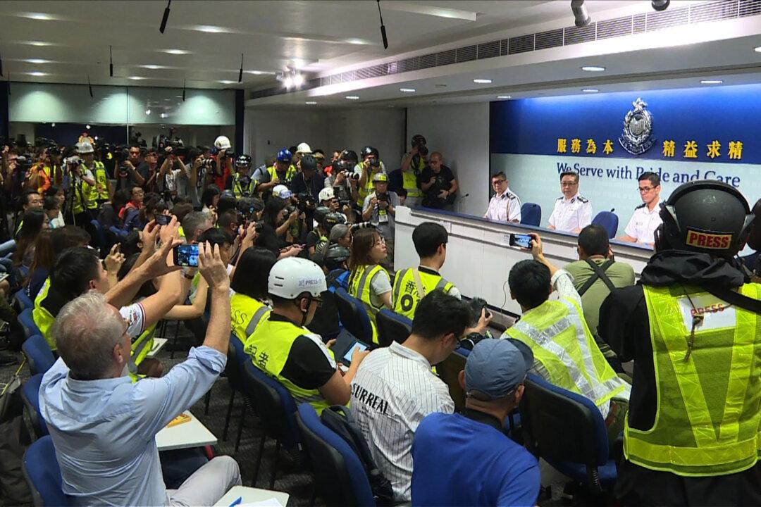 Report: Hong Kong Press Freedoms Hit New Lows as Police Hinder Protest Coverage, Beijing Influence Grows