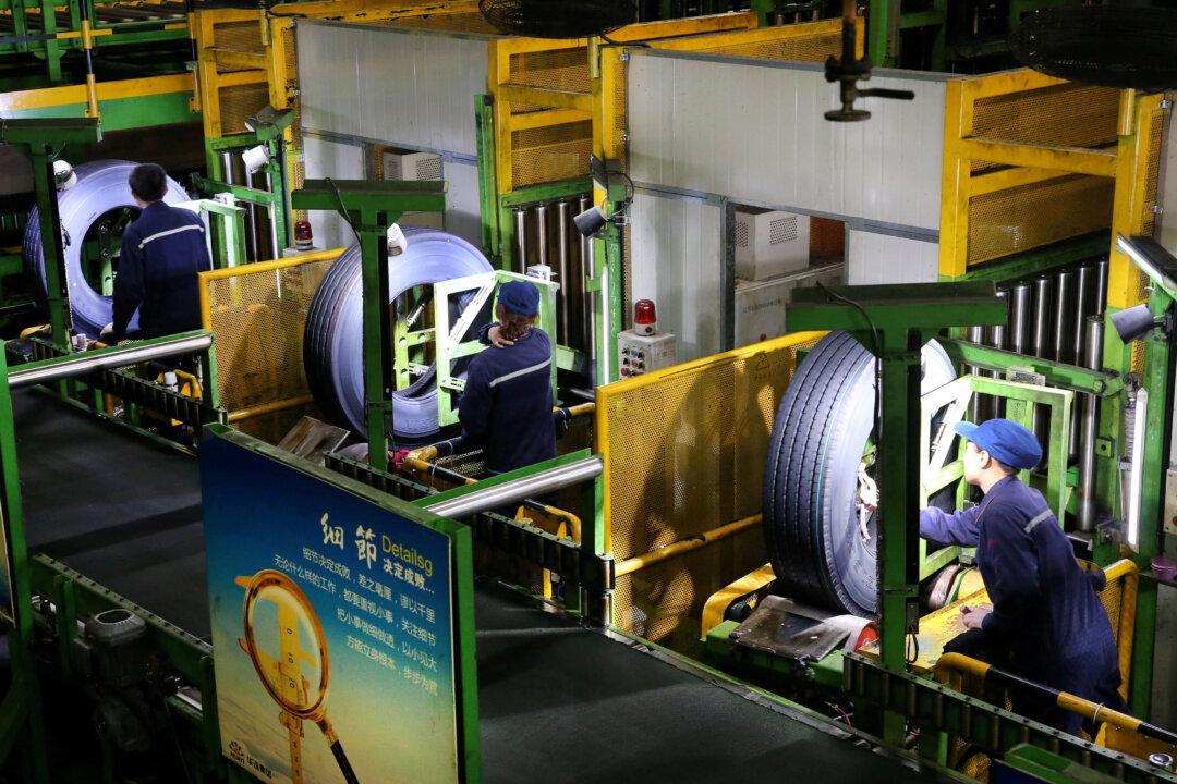 China Second Quarter GDP Growth Slows to 27-Year Low as Trade War Bites