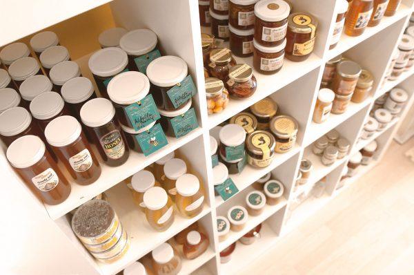 Honey products at a store, available for purchase to customers. The Canadian Food Inspection Agency's investigation found that more than one-fifth of the honey samples looked at were considered adulterated honey. (David Goehring/Flickr)