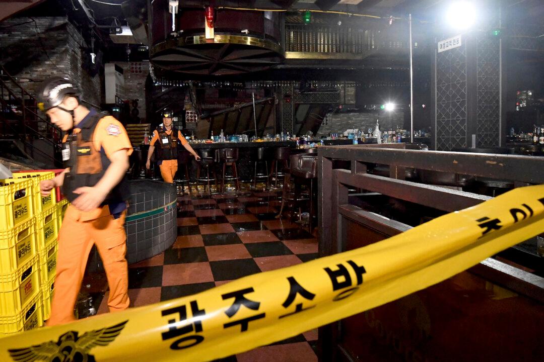 2 Dead, 8 Swimming Athletes Hurt in South Korea Balcony Collapse