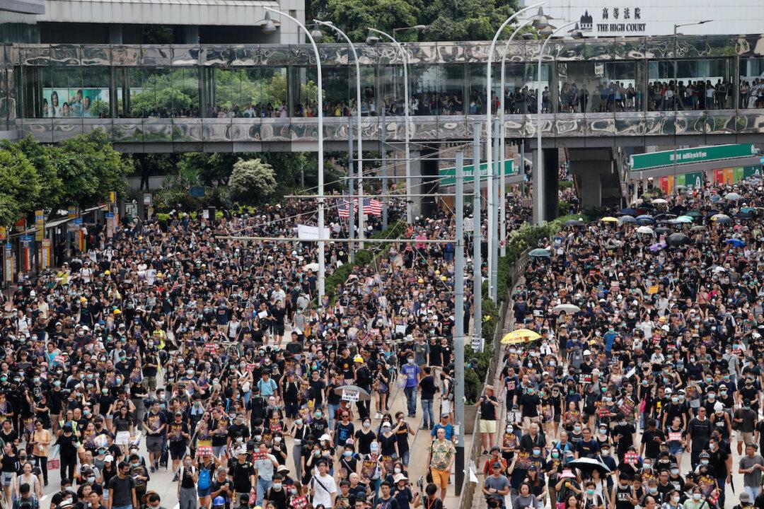 Protesters Mass in Hong Kong Amid Fears of Growing Cycle of Violence