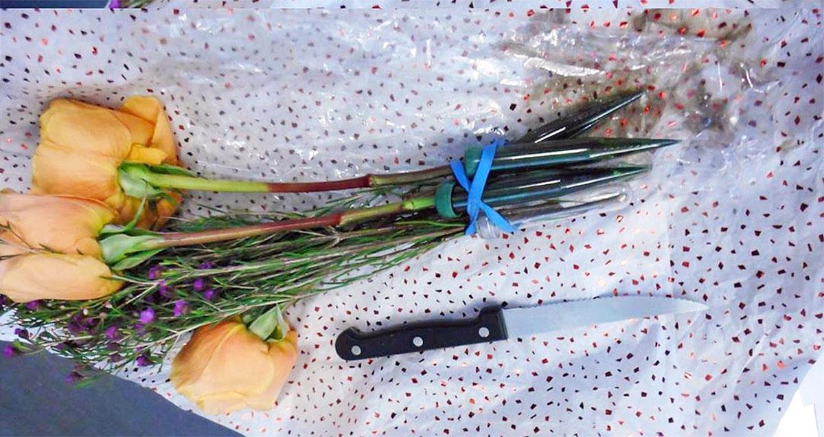 Airport Security Finds Passenger Carrying a Knife in Bunch of Flowers
