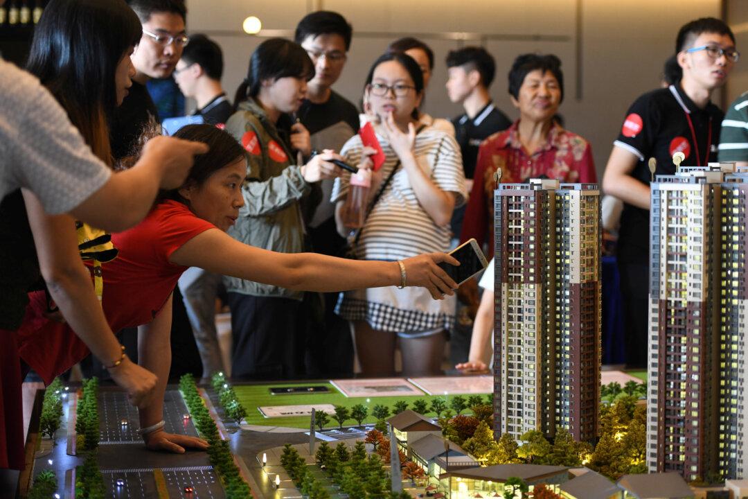 China’s Builders Brace for Winter: Buy Less Land as Home Sales Weaken