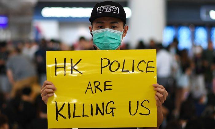 Flights Out of Hong Kong Airport Canceled As Protesters Flood Terminal