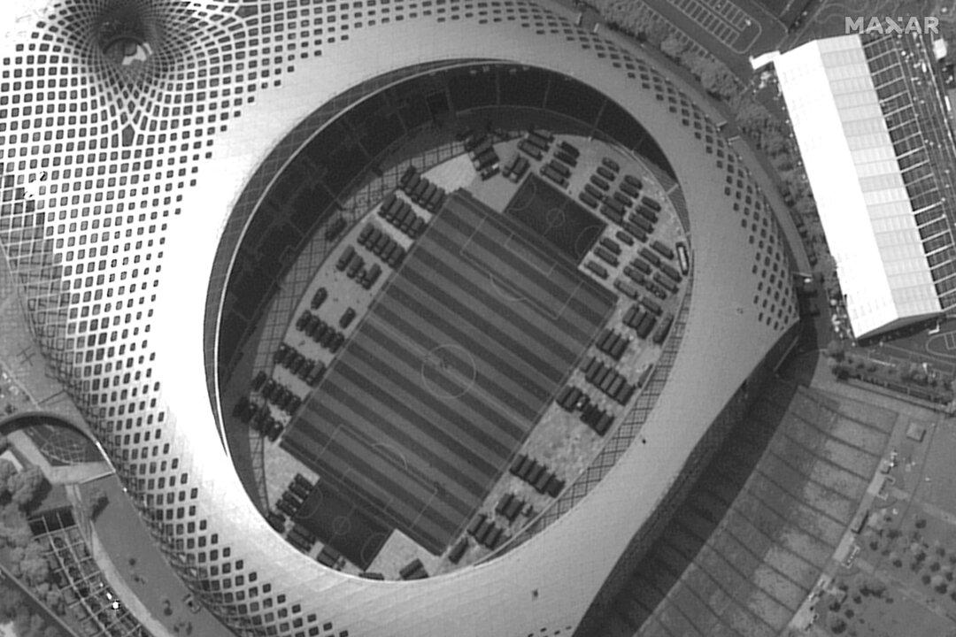 Satellite Photos Appear to Show Chinese Military Vehicles Near Hong Kong