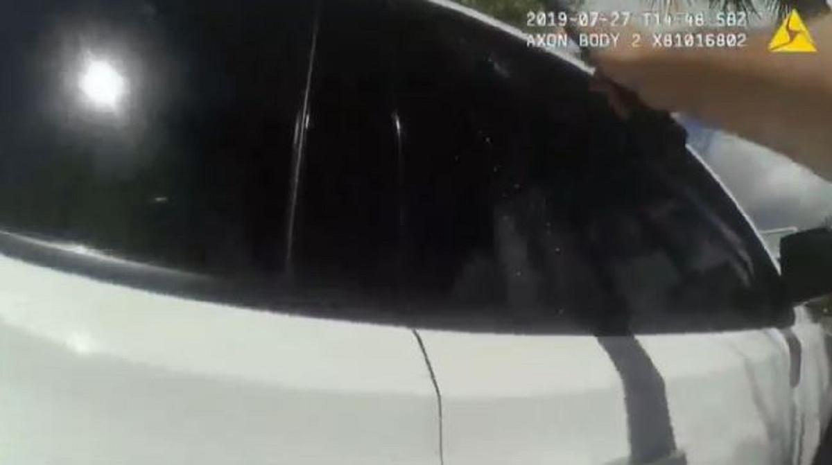 Video: Mother Locks Girl in Hot Car, Police Officer Shatters Window to Save the Baby