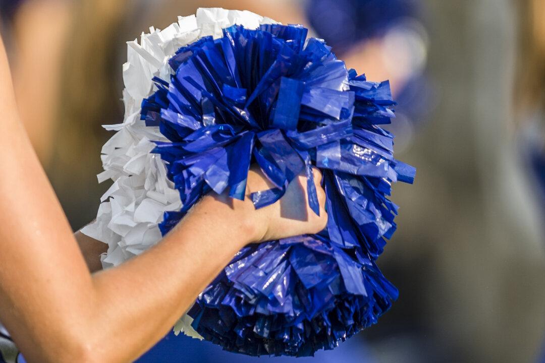 Cheerleader in Tears When Military Dad Is Absent, Then Teen Jumps Fence and Saves the Day