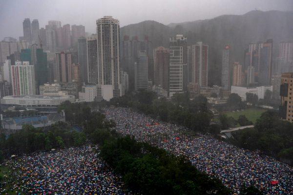 Protesters take part in a rally as they march on a street in Hong Kong, on Aug. 18, 2019. (Anthony Kwan/Getty Images)