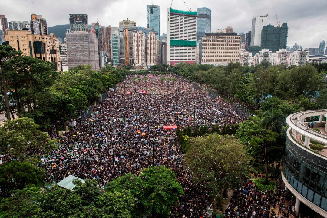 More Than 1.7 Million Hongkongers Defy Heavy Rain to Protest Police Violence