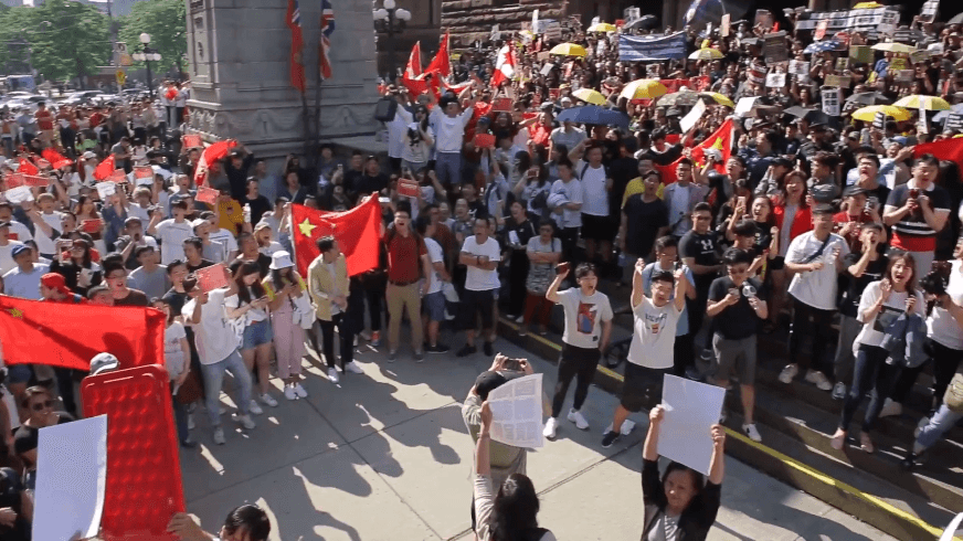 Hong Kong Supporters and Pro-Beijing Group Clash at Toronto Rally