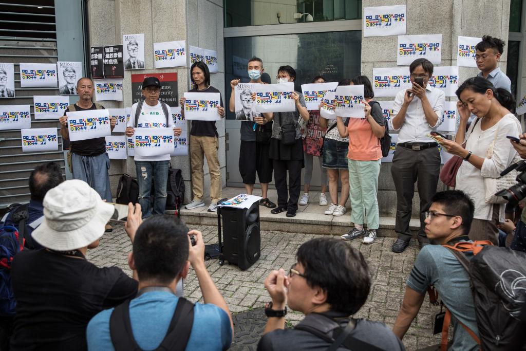 China Confirms It Has Detained Hong Kong British Consulate Staff as a Rally is Held Demanding His Release