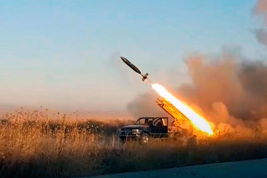 Syrian Kurds begin pullout from Turkish border