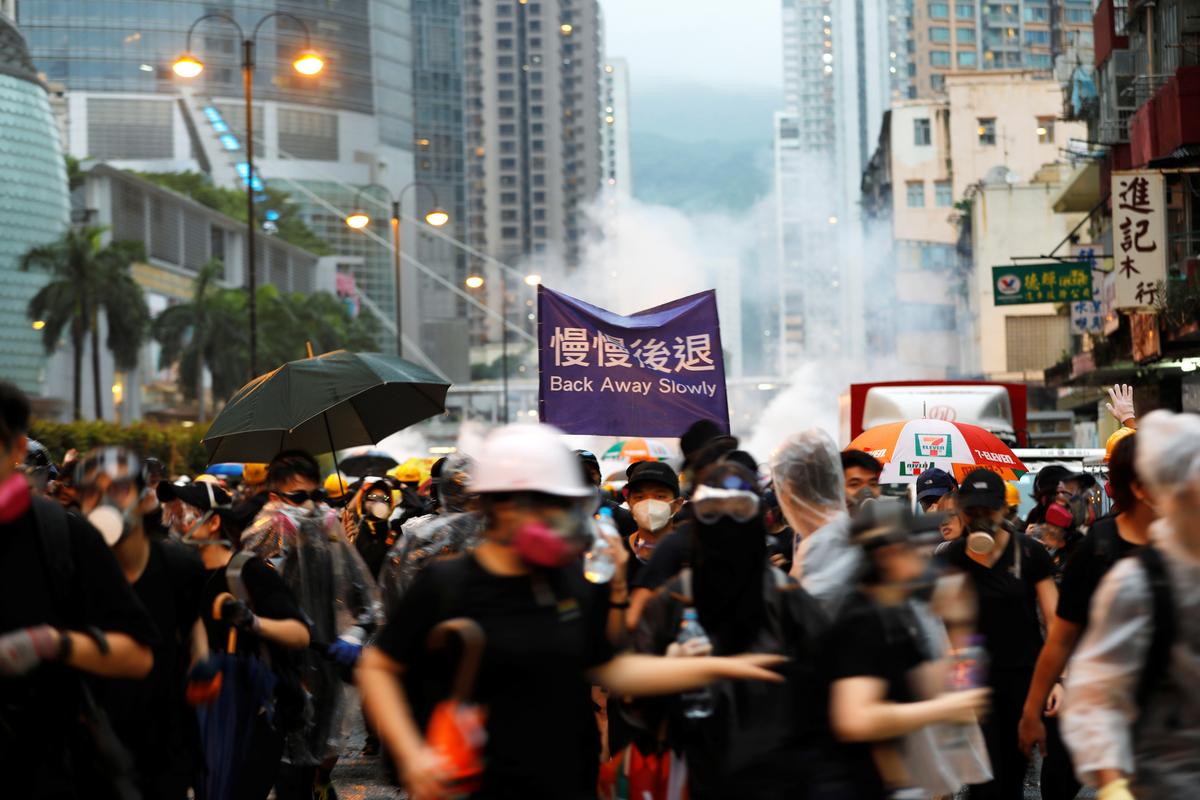 ‘Stop Terrorizing Cathay Staff,’ Hong Kong Protesters Tell Airline