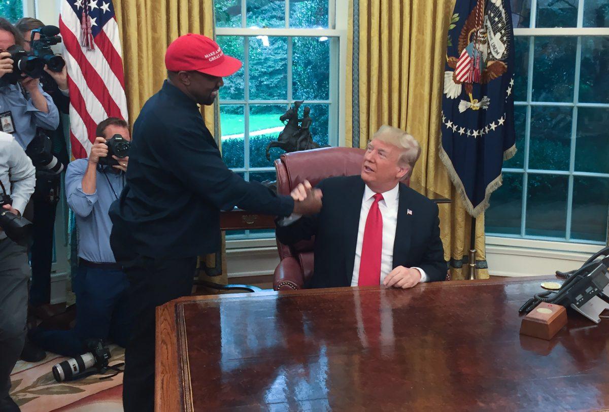 President Donald Trump meets with rapper Kanye West in the Oval Office of the White House in Washington on Oct. 11, 2018. (Sebastian Smith/AFP/Getty Images)