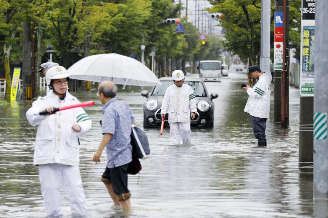 Record Rain in South Japan Brings Flood Chaos