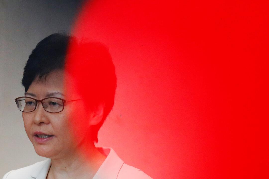 Hong Kong Leader Carrie Lam ‘Has to Serve Two Masters’