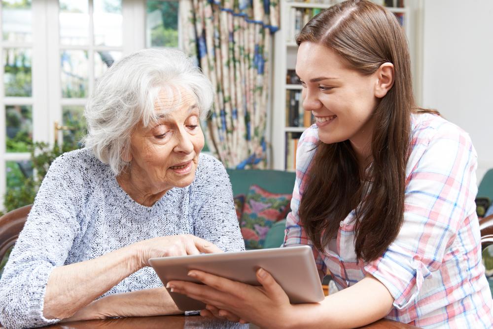 Illustration - Shutterstock | <a href="https://www.shutterstock.com/image-photo/teenage-granddaughter-showing-grandmother-how-use-296430281?src=-SzFhL6Tn2pSmH69U9vTew-1-12">SpeedKingz</a>