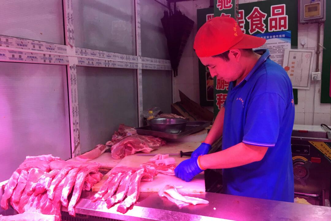 China Releases Stockpiled Pork to Cool Price Surge